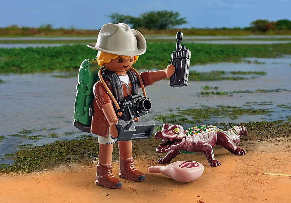 Reasearcher with young Caiman